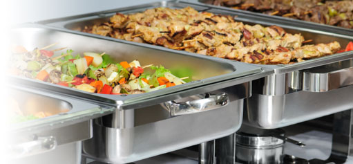 Thai buffet dishes arranged in catering trays